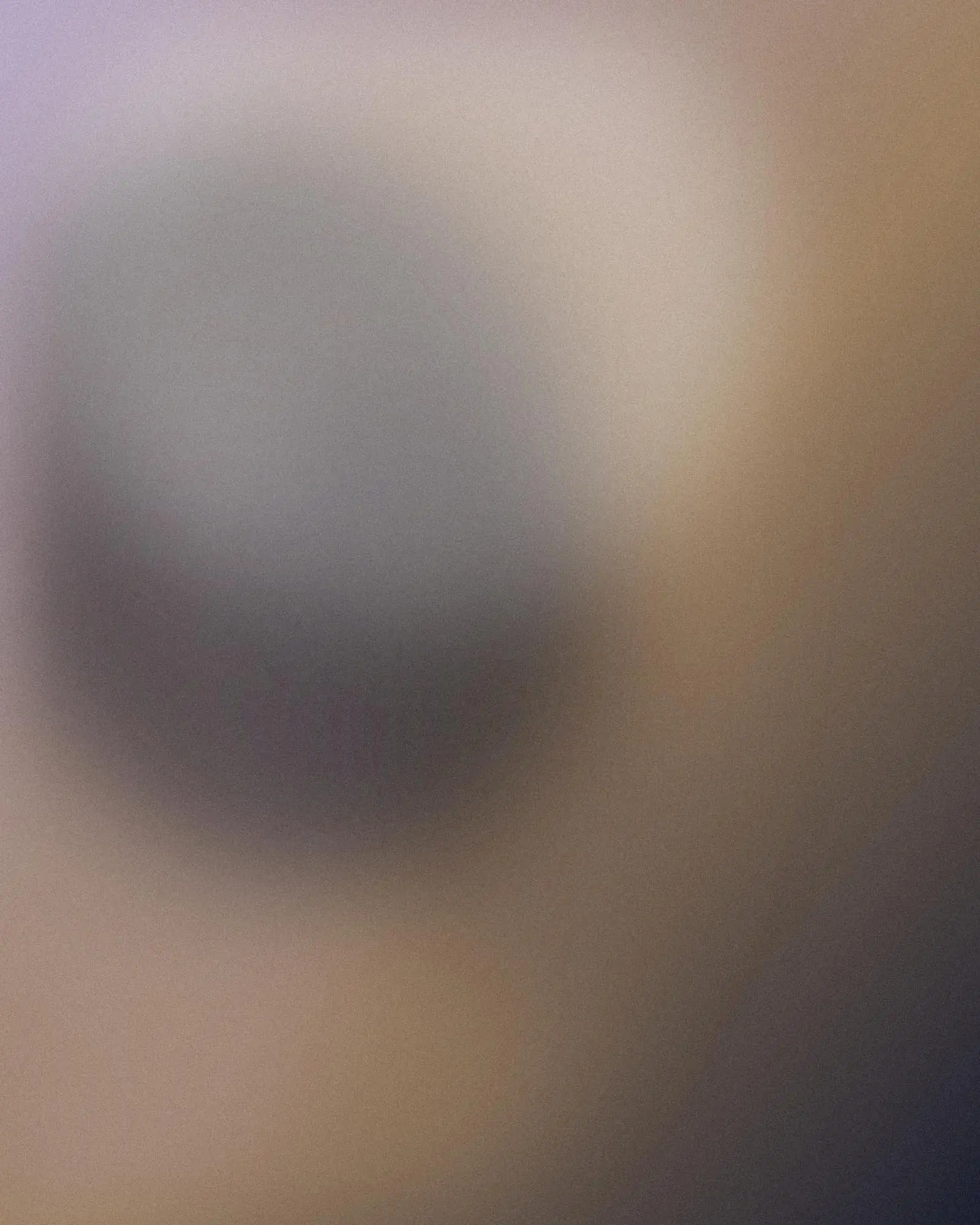 Placeholder headshot, a soft lilac and wood-toned blur