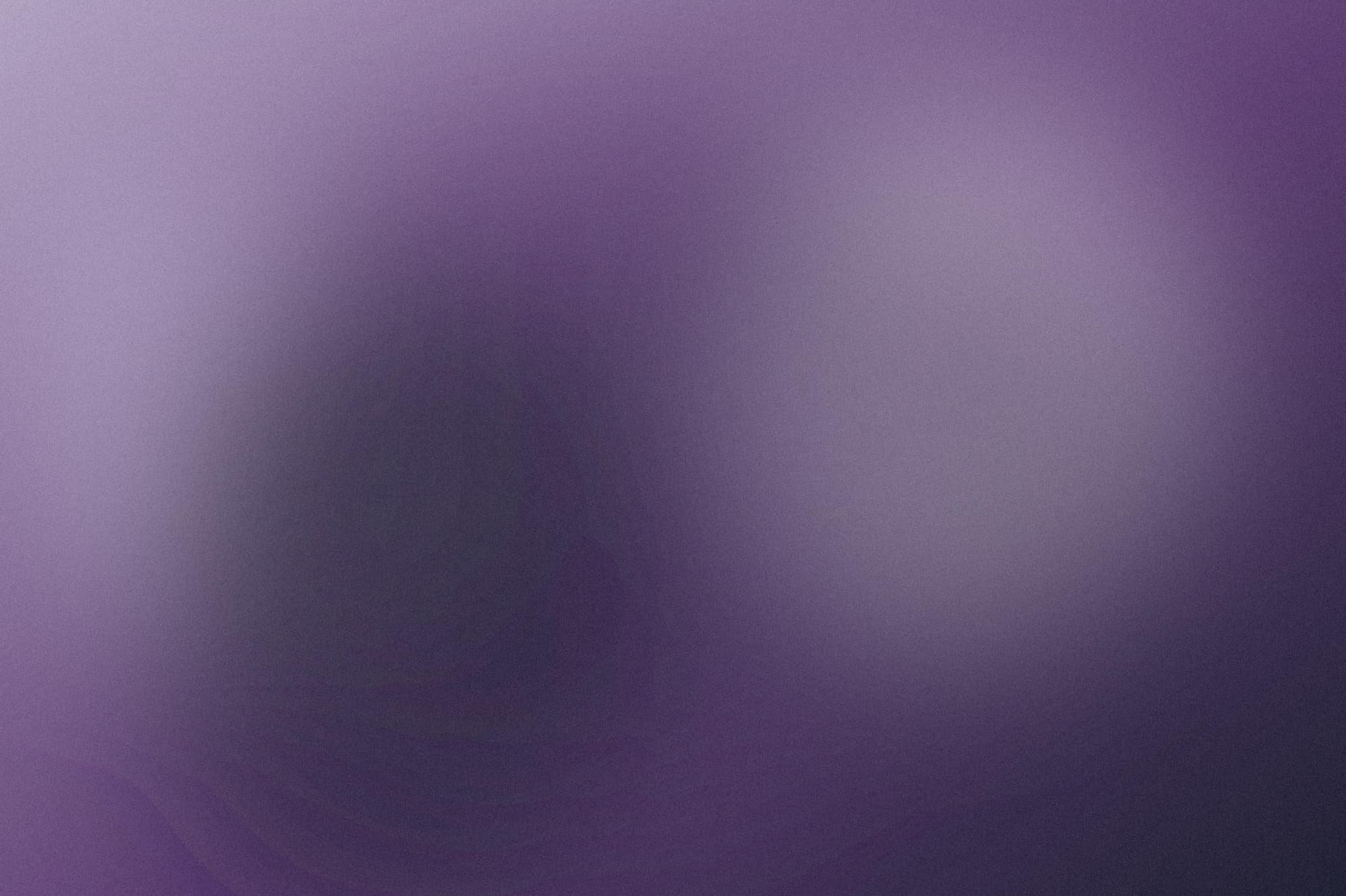 Placeholder still, a soft violet blur standing in for a company photo