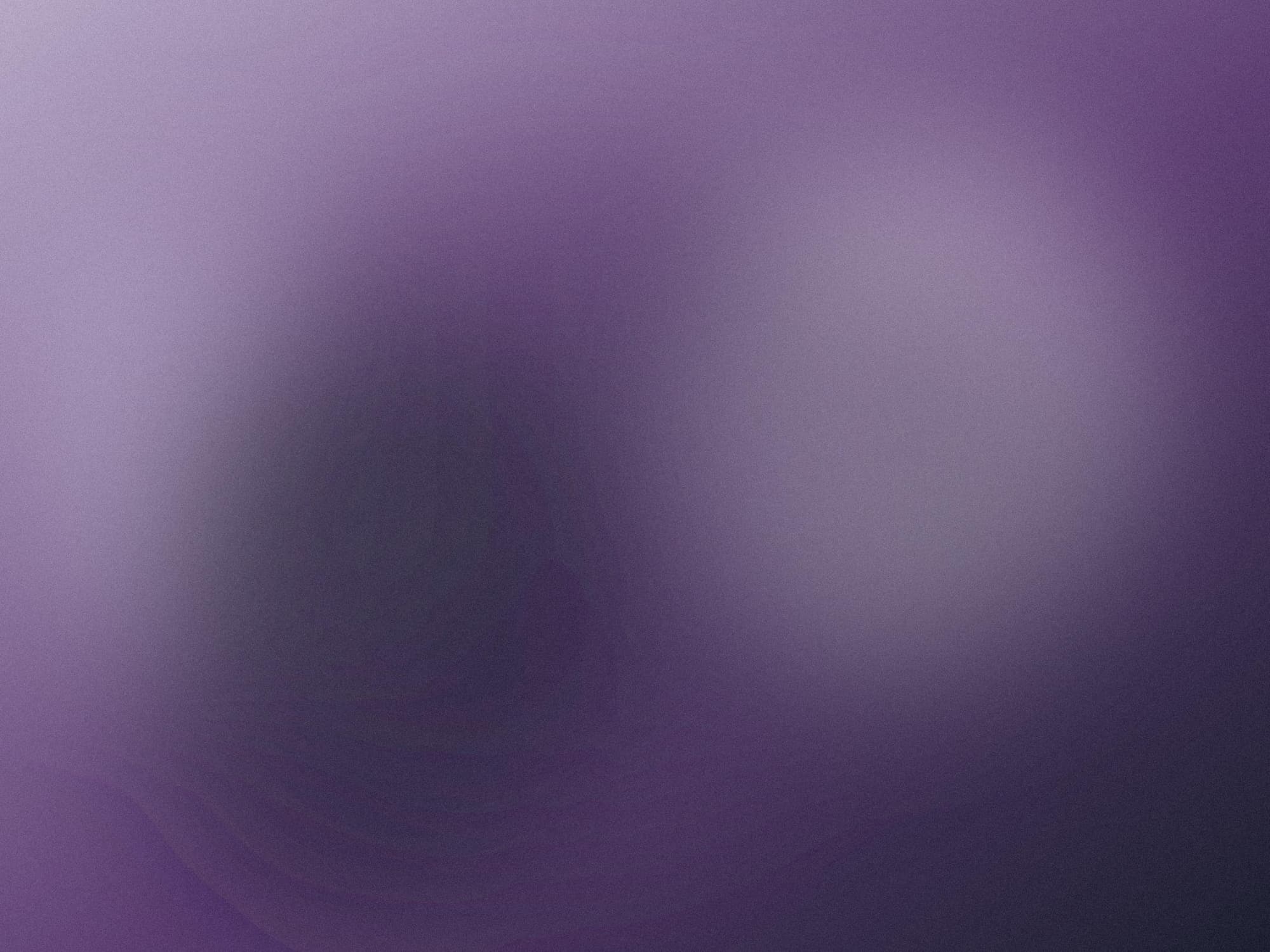 Placeholder still, a soft violet blur standing in for a company photo